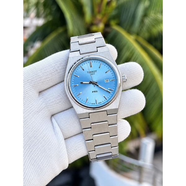 TISOT PRX QUARTZ SKYBLUE PLANE DIAL AT358