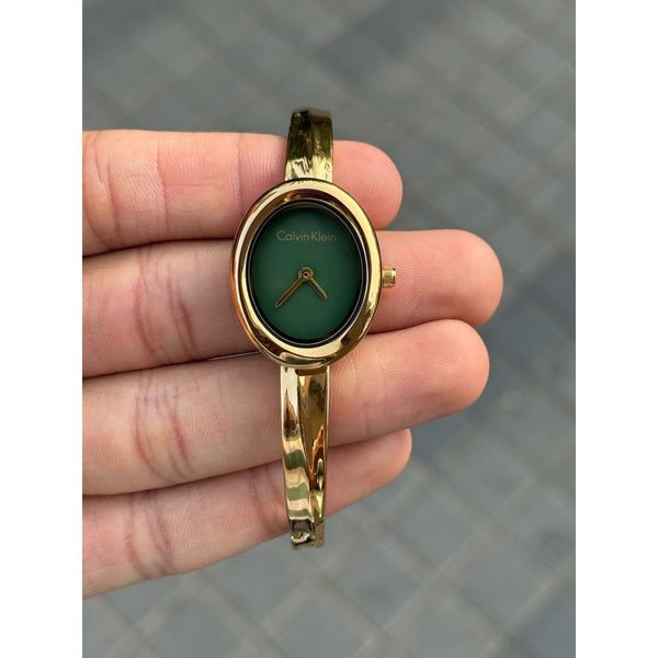 Calvin Klei n Oval Twisted Bezel Women Gold Green