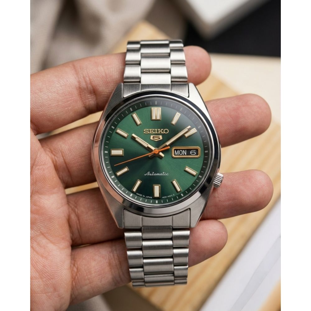 Seiko_o 5 Sports SNXS Automatic silver  green and Red niddle
