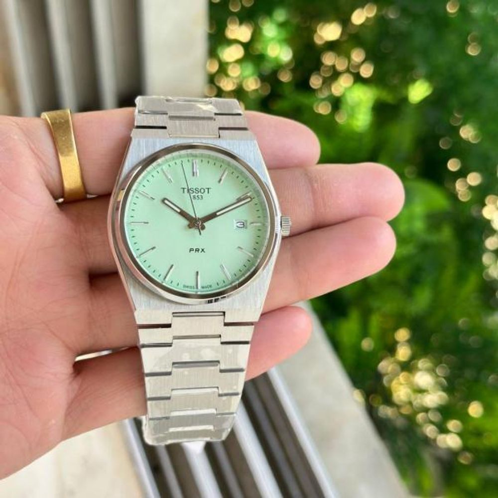 Tissoo_t 1853 Prx Powermatic Quartz silver light green plan