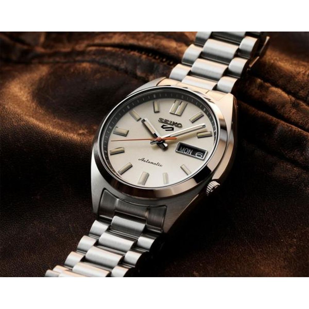 Seiko_o 5 Sports SNXS Automatic silver Gray