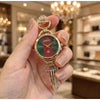 GUCHI GOLD-GREEN WATCH FOR HER 1065