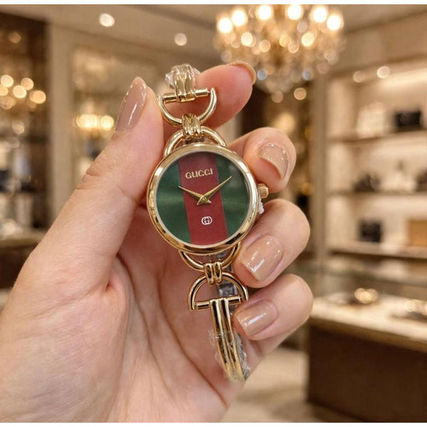 GUCHI GOLD-GREEN WATCH FOR HER 1065