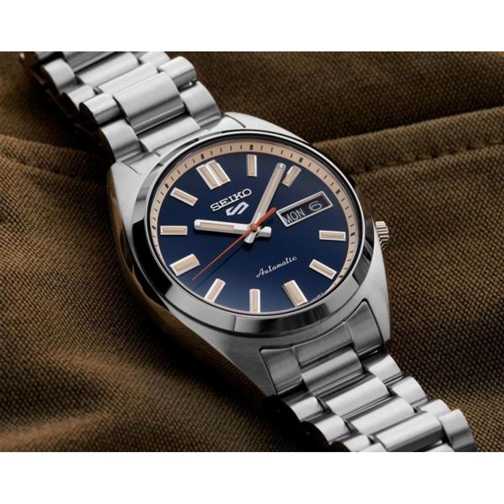 Seiko_o 5 Sports SNXS Automatic silver blue