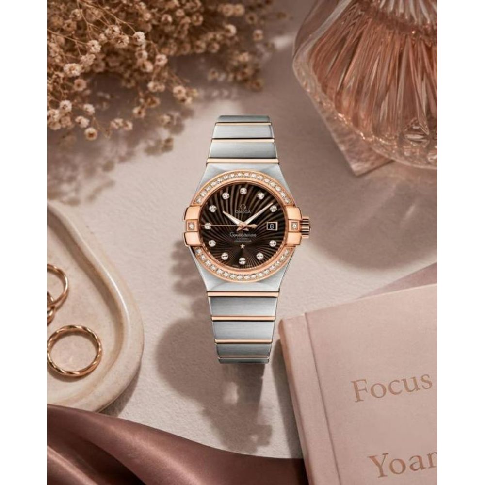 Omeg_ga Constellation Quartz luxury watch.