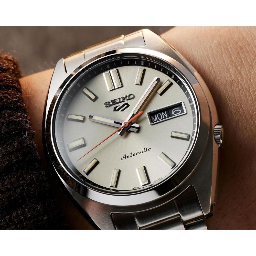 Seiko_o 5 Sports SNXS Automatic silver Gray