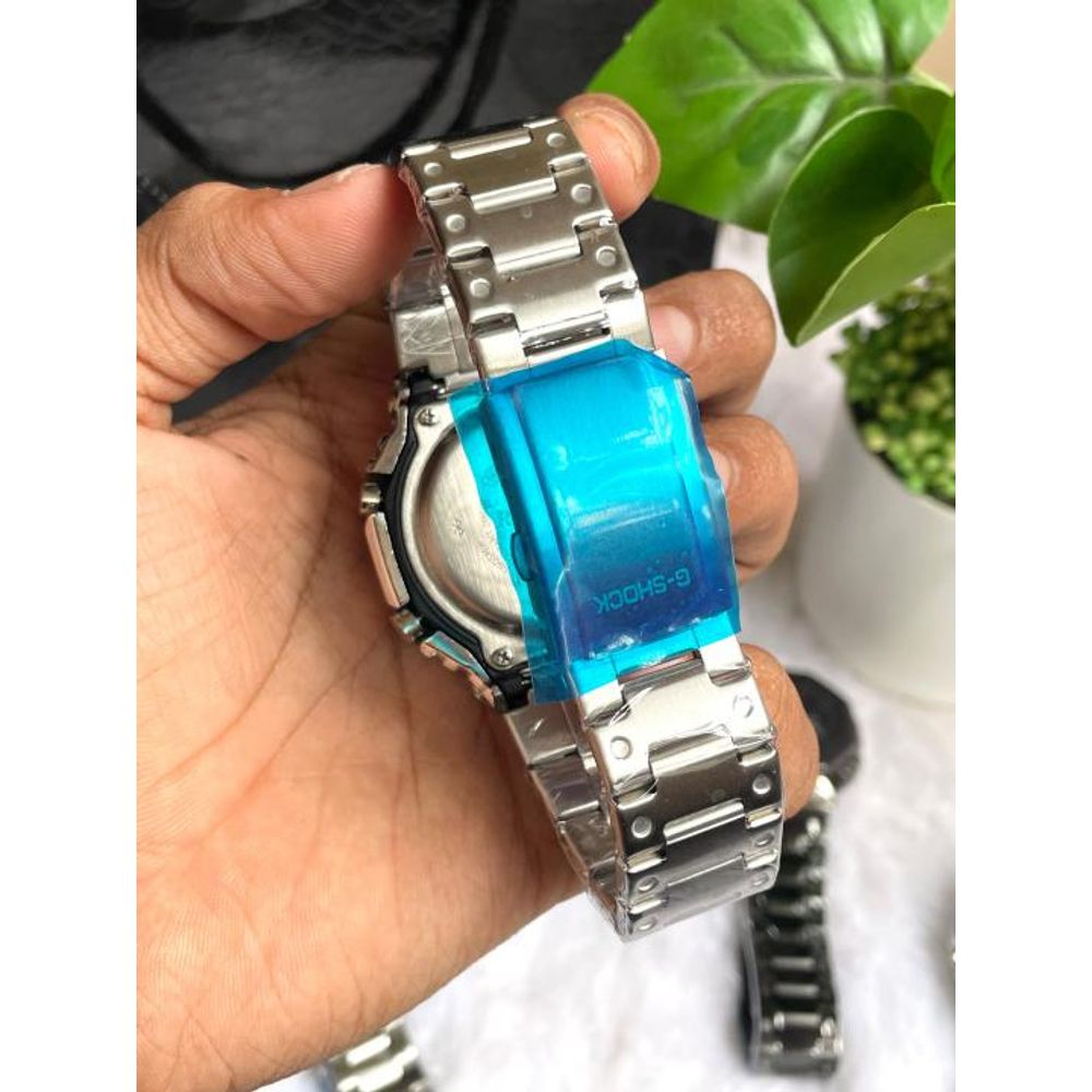 CASIO GSHOCK B2100 METAL SILVER BLUE DIAL AT308