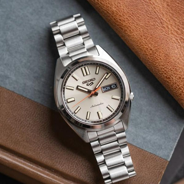 Seiko_o 5 Sports SNXS Automatic silver Gray
