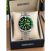 Seiko Sports GMT A Open Back 4 Hand Green Dial AT438