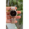 Movado slim rose gold black dial
