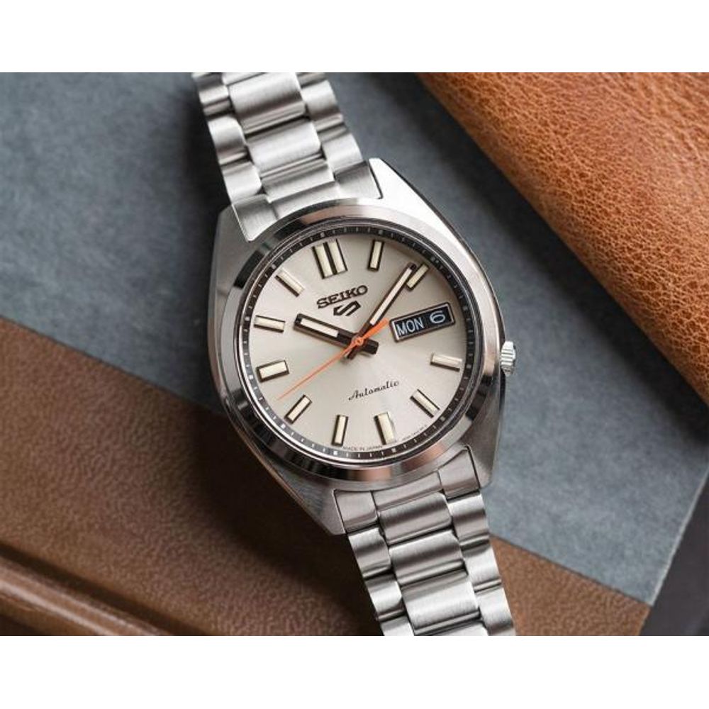 Seiko_o 5 Sports SNXS Automatic silver Gray