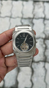 bvlgarr_i   Octo Finissimo watch features a distinctive tourbillon complication visible at the 6 oclock position.   automatic back opne  most premium stainless steel