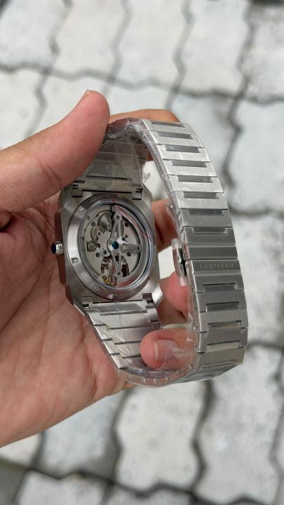 bvlgarr_i   Octo Finissimo watch features a distinctive tourbillon complication visible at the 6 oclock position.   automatic back opne  most premium stainless steel