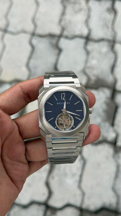bvlgarr_i   Octo Finissimo watch features a distinctive tourbillon complication visible at the 6 oclock position.   automatic back opne  most premium stainless steel