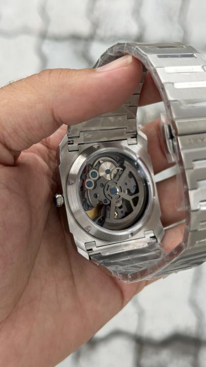 Bulgari Octo Finissimo watch featuring a unique custom dial with an astronaut design and a flying tourbillon at the 6 oclock position.